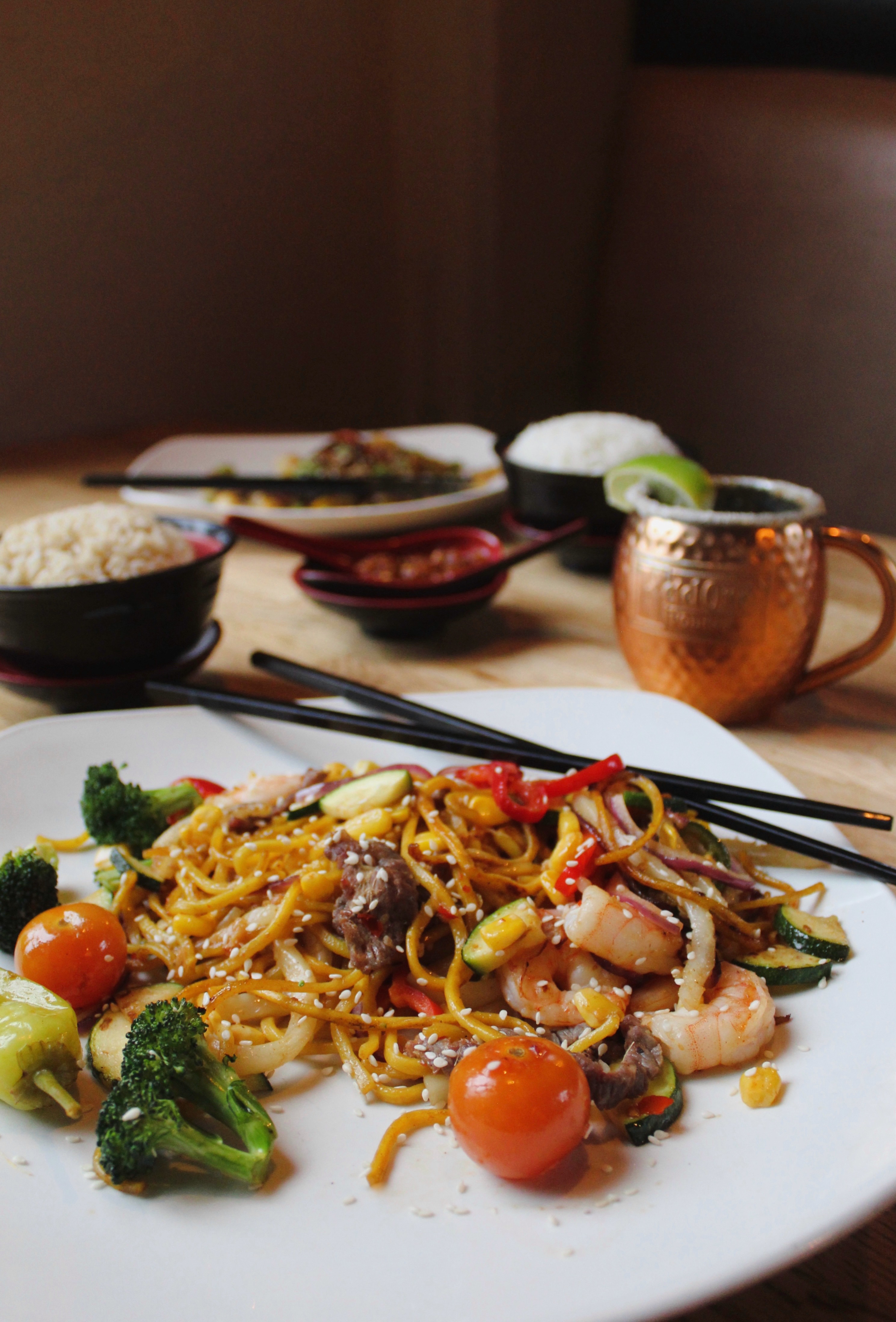 Noodle stir-fry with rice and Moscow Mule